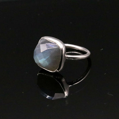 Unisex sterling silver band ring with a vibrant blue fire labradorite stone, crafted by Tribal Ornaments.