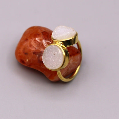 Sterling silver handmade wedding anniversary double stone ring by TRIBAL ORNAMENTS, featuring intricate band design and two sparkling stones.