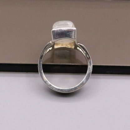 925 silver rainbow moonstone wedding ring band by Tribal Ornaments, featuring a vibrant, polished gemstone for special occasions.