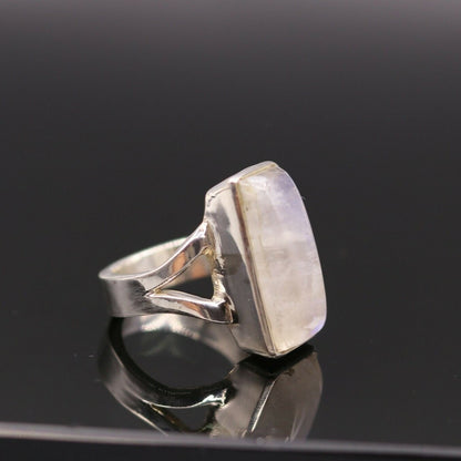 925 silver anniversary wedding rainbow moonstone ring by Tribal Ornaments, featuring a sleek band with colorful moonstone accents.