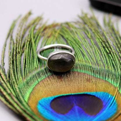 Unisex silver ring with a striking blue fire labradorite gemstone, crafted by Tribal Ornaments, featuring a solid 925 silver band.