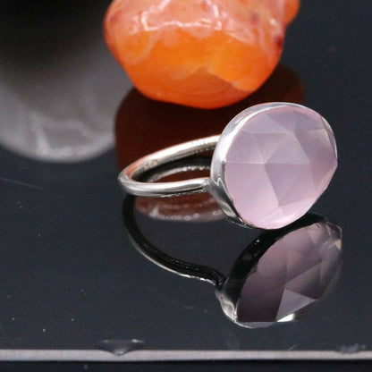 Unisex pink rose quartz handmade silver ring by Tribal Ornaments featuring a solid 925 silver band.