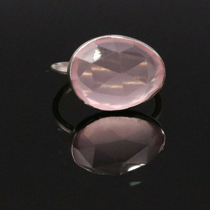 Unisex handmade silver ring featuring a pink rose quartz gemstone, crafted by Tribal Ornaments.