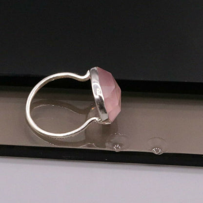 Unisex pink rose quartz silver ring by Tribal Ornaments featuring a handmade 925 sterling silver band.