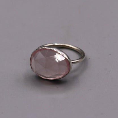 Unisex handmade pink rose quartz ring with 925 solid silver band by Tribal Ornaments, showcasing intricate craftsmanship.