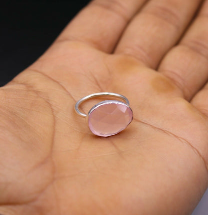 Unisex pink rose quartz handmade ring band in 925 solid silver by Tribal Ornaments, showcasing intricate craftsmanship.
