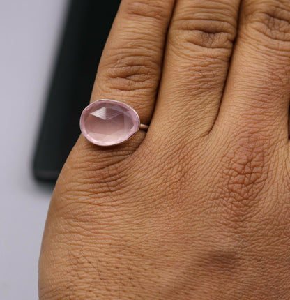 Unisex handmade pink rose quartz ring with 925 solid silver band by Tribal Ornaments, showcasing intricate craftsmanship and natural stone.