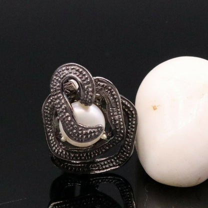 Vintage antique style sterling silver pearl ring by Tribal Ornaments, featuring a detailed band and elegant pearl centerpiece.
