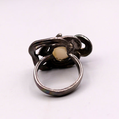 Vintage antique-style 925 sterling silver pearl ring by Tribal Ornaments, featuring a detailed band with a shimmering pearl accent.