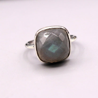 Solid silver 925 wedding ring with blue fire labradorite stone, featuring a band design by Tribal Ornaments.