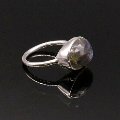 Excellent blue fire labradorite stone 925 silver unisex ring by TRIBAL ORNAMENTS featuring a polished band and vibrant gemstone.