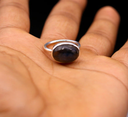 Unisex silver ring featuring a vibrant blue fire labradorite stone set in a 925 solid silver band by Tribal Ornaments.