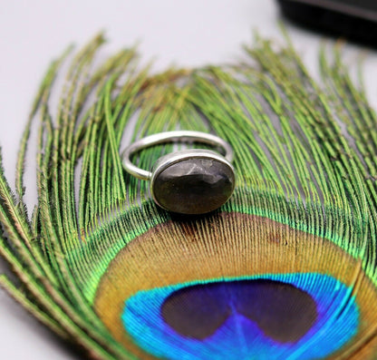 Unisex silver ring featuring a blue fire labradorite gemstone set in a 925 solid silver band, crafted by Tribal Ornaments.