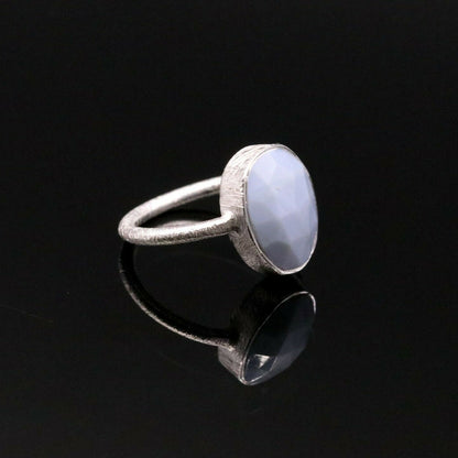 Handmade silver ring with a vibrant stone, unisex design, from Tribal Ornaments, ideal for anniversary gifting.