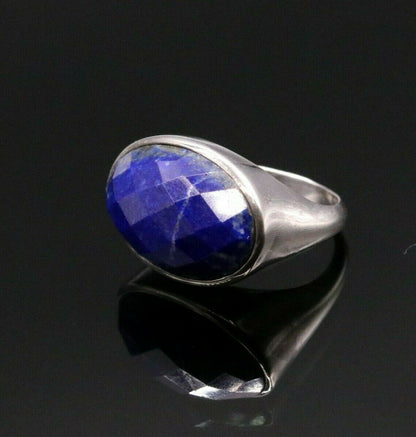 Unisex silver ring with simulated sapphire stone and intricate tribal design, crafted from 925 solid silver.