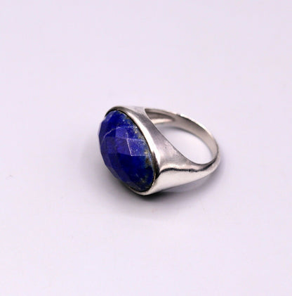 Unisex silver ring with simulated sapphire stone, crafted from 925 solid silver, featuring intricate Indian jewelry design.