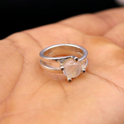 Tribal Ornaments silver anniversary wedding ring featuring a rainbow moonstone band in 925 silver craftsmanship.