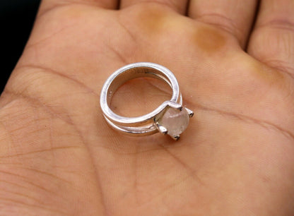 925 silver anniversary wedding ring with rainbow moonstone, tribal ornaments design, featuring a smooth band and elegant gemstone.