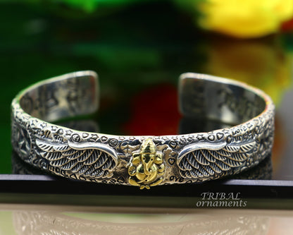 Polished 925 sterling silver or gold Lord Ganesh tribal cuff bracelet with adjustable fit, featuring intricate ethnic tribal jewelry design.