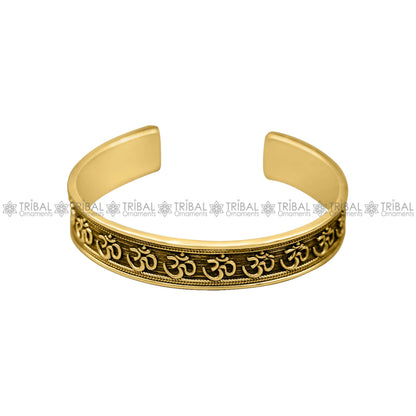 Handcrafted sterling silver or gold polished 'AUM' mantra bangle bracelet, unisex adjustable ethnic jewelry from Tribal Ornaments.