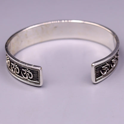 Handcrafted 925 sterling silver or gold polished 'AUM' mantra bangle bracelet, adjustable unisex ethnic jewelry from India.
