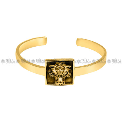 Sterling silver or gold polished handmade lion face design adjustable bangle bracelet by Tribal Ornaments, unisex Indian jewelry.