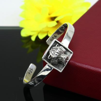 Sterling silver or gold polished handmade lion face design adjustable bangle bracelet by TRIBAL ORNAMENTS, unisex Indian jewelry.