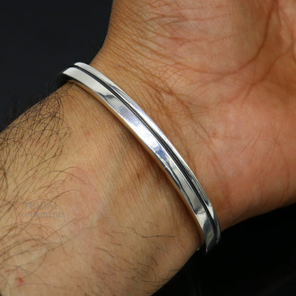 Polished handmade 925 sterling silver or gold bangle cuff bracelet with plain tribal design, unisex jewelry from TRIBAL ORNAMENTS.