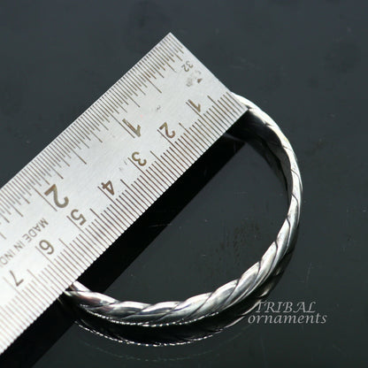 Sterling silver or gold polished handmade open face adjustable bangle cuff bracelet with unique tribal design by TRIBAL ORNAMENTS