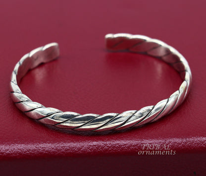 Sterling silver or gold polished handmade open face adjustable bangle cuff bracelet with unique tribal design by TRIBAL ORNAMENTS.