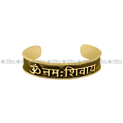 Sterling silver handmade open face cuff bracelet featuring "Aum namah shivay" design, polished silver or gold finish, by TRIBAL ORNAMENTS.