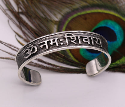Sterling silver "Aum Namah Shivay" open face cuff bracelet, handmade tribal ornament with polished silver or gold finish.