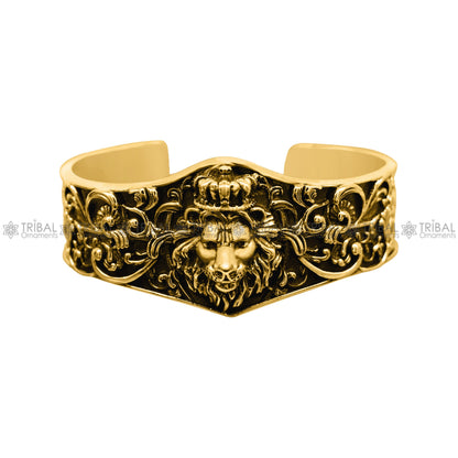 Handmade lion cuff bracelet in 925 sterling silver, polished to a shine, with gold or silver finish, by TRIBAL ORNAMENTS.
