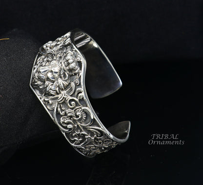 Handmade silver or gold lion cuff bracelet by TRIBAL ORNAMENTS, featuring intricate sterling silver craftsmanship and polished finish.