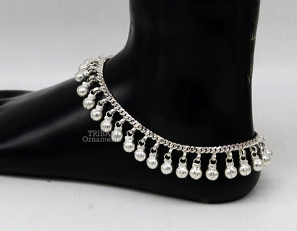 Sterling silver ankle bracelet with jingling bells, handmade tribal jewelry for belly dance, featuring noisy, customizable design.