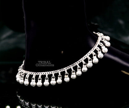Sterling silver ankle bracelet with 10.5-inch jingling bells, handmade tribal design, perfect for belly dance jewelry.