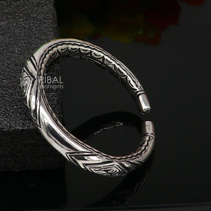 925 Sterling silver chitai work bangle bracelet by TRIBAL ORNAMENTS, unisex personalized jewelry with intricate design.