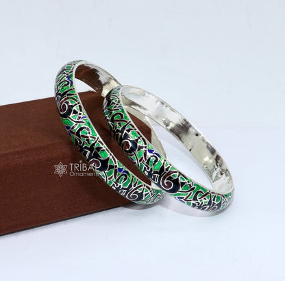 Sterling silver Meenakari bangle bracelet with colorful enamel elephant design, handmade tribal jewelry from India.