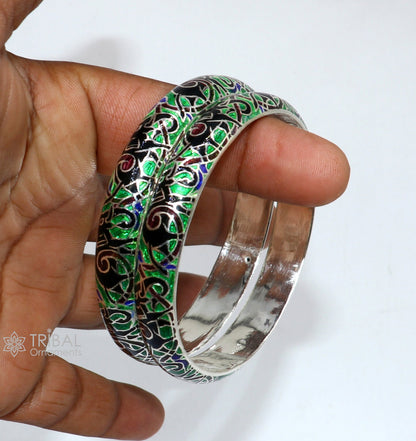 Sterling silver Meenakari bangle bracelet with colorful enamel elephant design, handmade tribal jewelry from India.