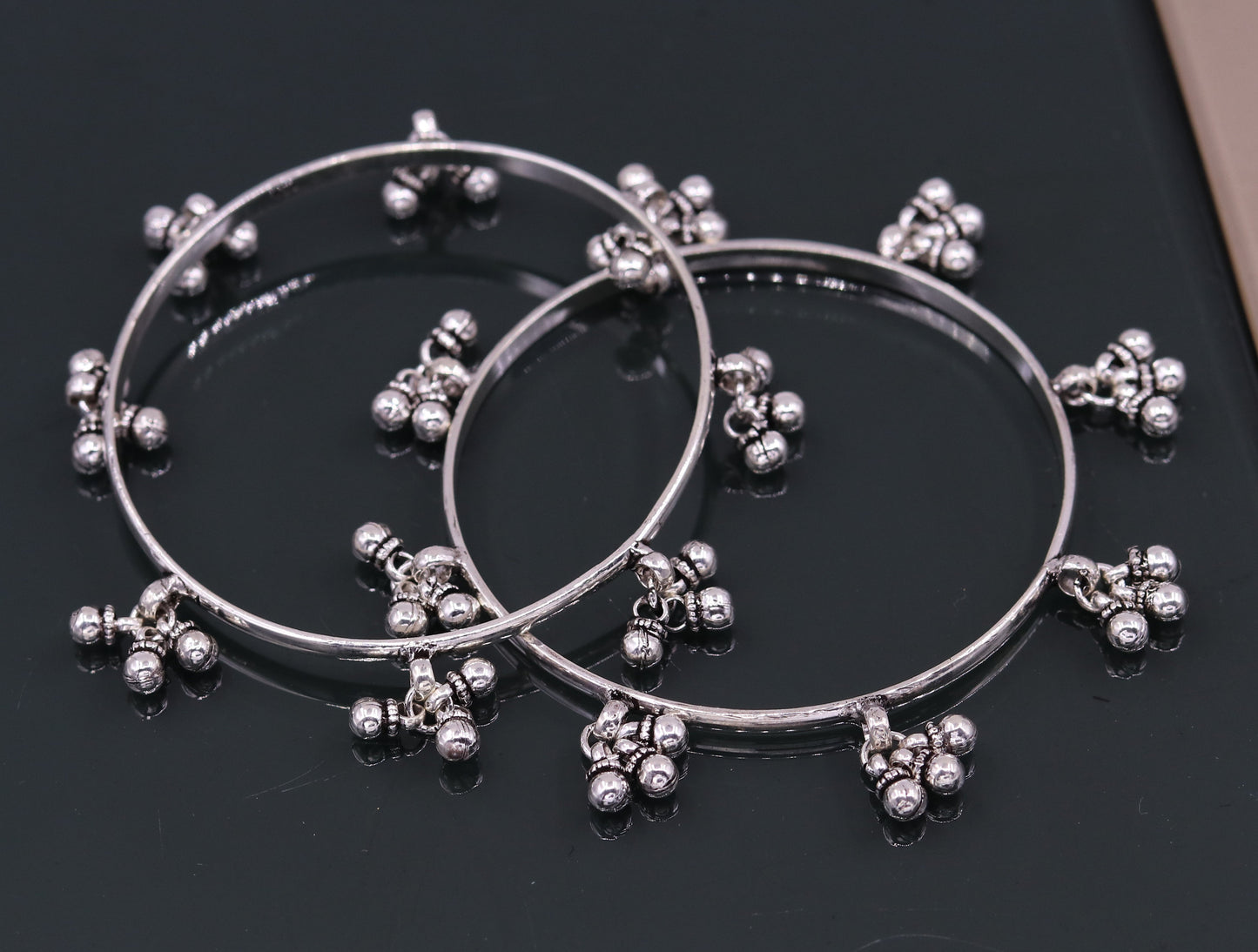 Sterling silver handmade tribal charm bangle bracelet with intricate designs, perfect for tribal belly dance jewelry, by TRIBAL ORNAMENTS.
