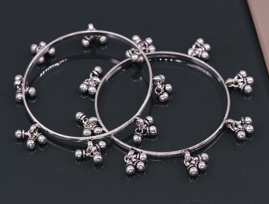 Sterling silver handmade tribal charm bangle bracelet with intricate designs, perfect for tribal belly dance jewelry, by TRIBAL ORNAMENTS.