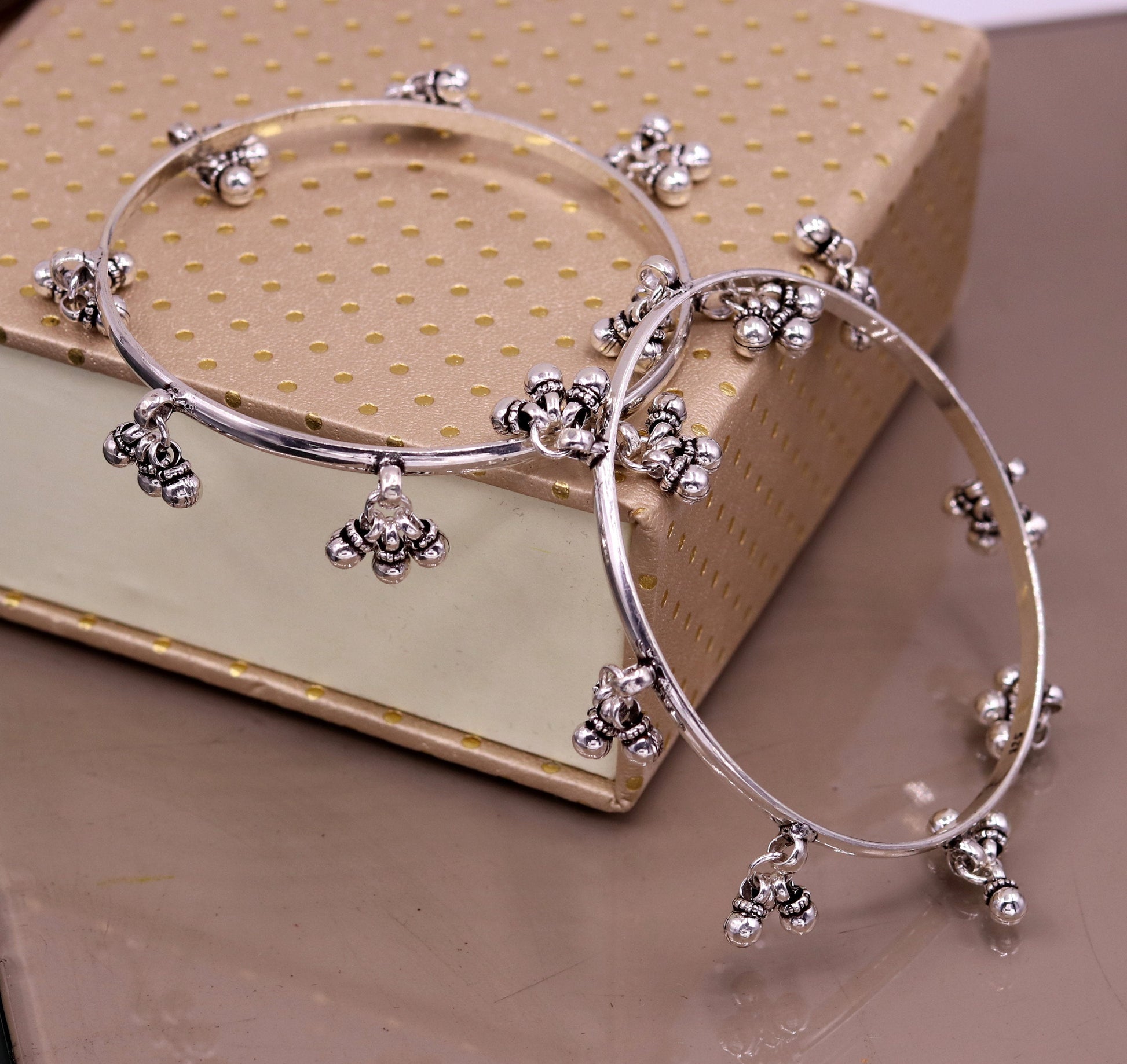Sterling silver handmade charm bangle bracelet with tribal design, perfect for belly dance jewelry and gifting.