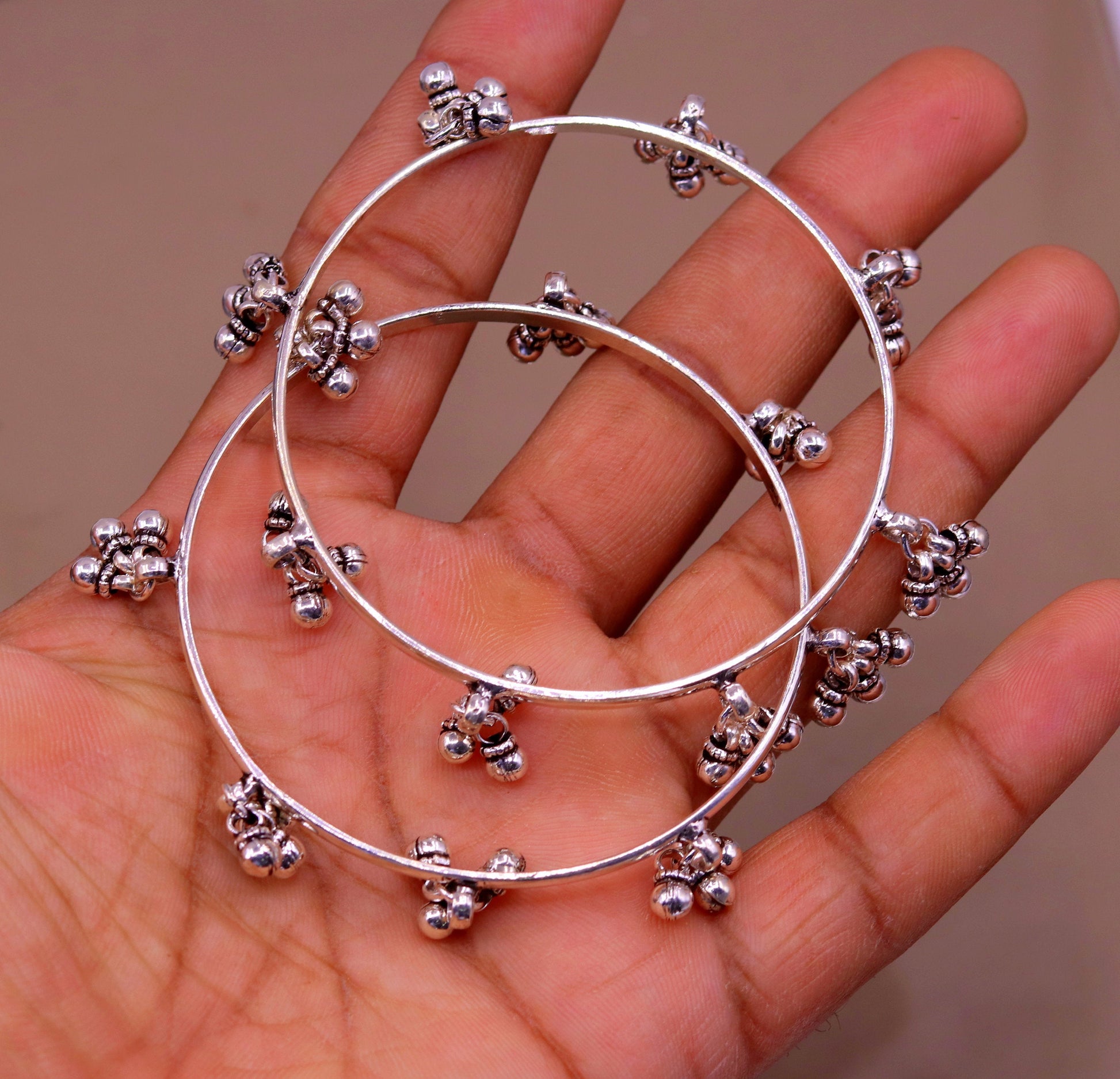 Sterling silver handmade charm bangle bracelet with tribal-inspired design, perfect for tribal belly dance or personalized jewelry.