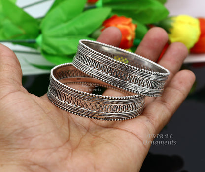 Sterling silver handmade vintage tribal bangle bracelet with intricate filigree design, ideal for ethnic or bridal jewelry.