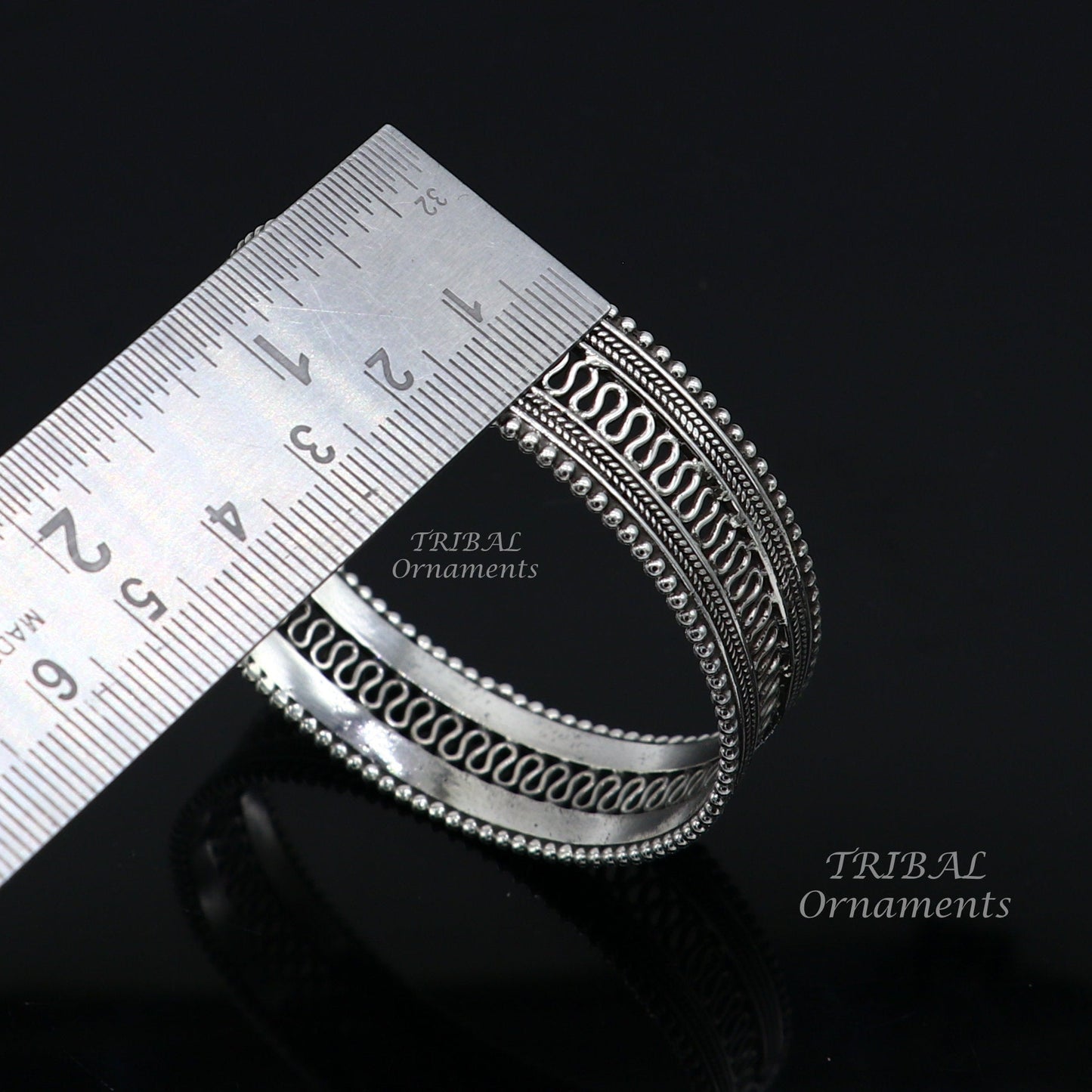 Sterling silver handmade vintage tribal bangle bracelet with intricate filigree design, perfect for ethnic jewelry and special occasions.
