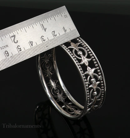 Sterling silver bangle bracelet with waved tiny ball design, customizable ethnic jewelry by TRIBAL ORNAMENTS, perfect for brides.