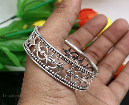 Sterling silver tribal bangle bracelet with waved tiny ball design, customizable jewelry suitable for brides and ethnic gifting.
