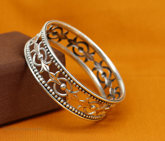 Sterling silver bangle bracelet with waved tiny ball design, handcrafted ethnic jewelry by TRIBAL ORNAMENTS for brides and special occasions.
