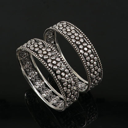Sterling silver wide floral bangle bracelet by TRIBAL ORNAMENTS, featuring intricate floral design, perfect for ethnic bridal jewelry.