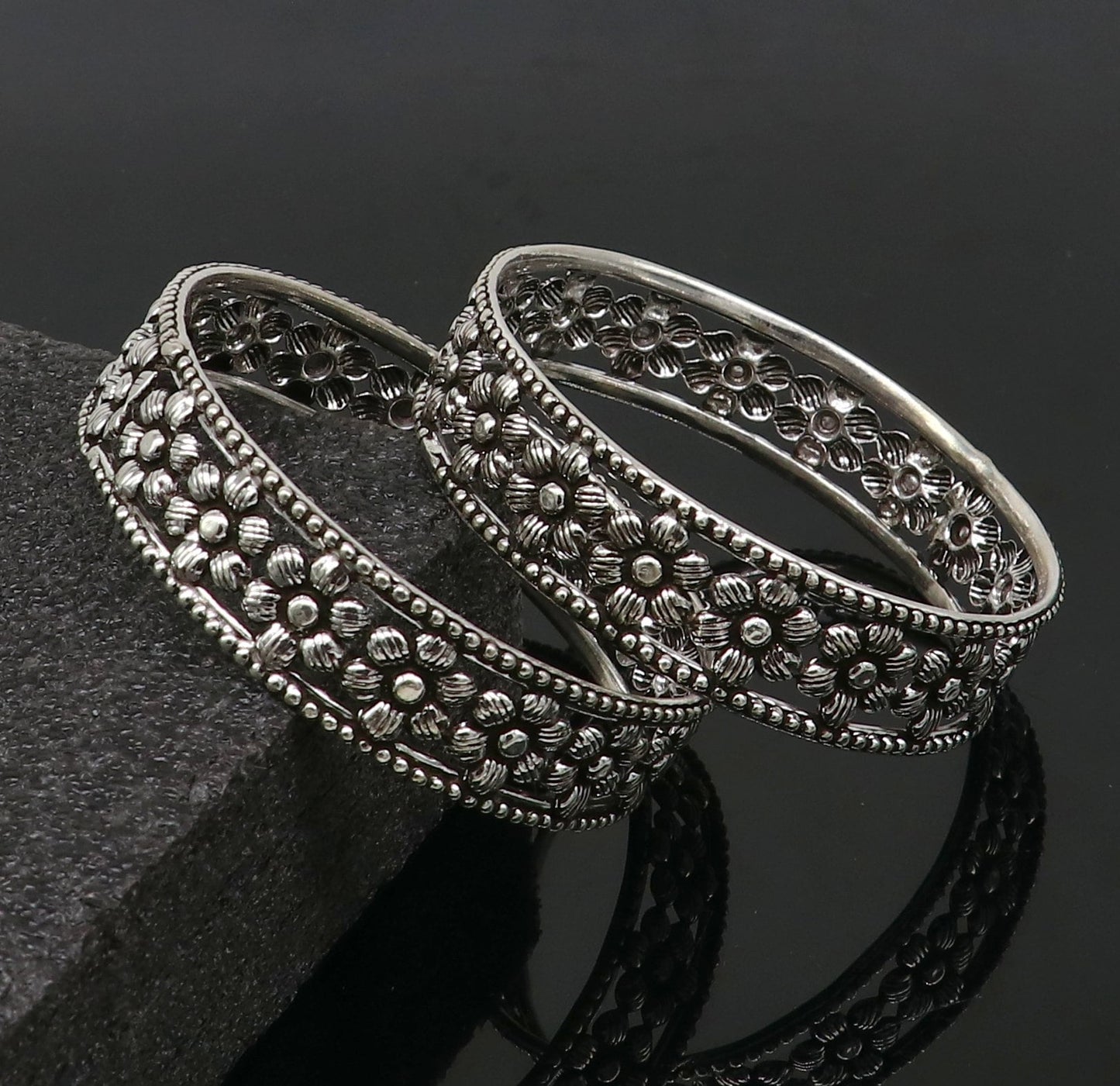 925 sterling silver wide floral design bangle bracelet by TRIBAL ORNAMENTS, showcasing intricate ethnic style and customizable details.